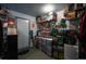 Walk in pantry featuring ample storage space, shelving, and a refrigerator at 19258 E Kansas Dr, Aurora, CO 80017