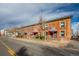 Brick building with multiple units and street parking at 2306 Glenarm Pl # 206, Denver, CO 80205