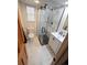 Modern bathroom with glass-enclosed shower, sleek vanity, and stylish fixtures at 5973 S Krameria St, Centennial, CO 80111