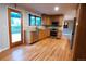 Well-lit kitchen featuring wood cabinets, stainless appliances, and a breakfast nook at 5973 S Krameria St, Centennial, CO 80111