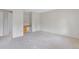 Large bedroom featuring built-in shelving and desk plus carpeted floor at 2453 S Memphis Way, Aurora, CO 80013