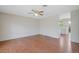 Cozy living room featuring hardwood floors, neutral paint, and open access to the kitchen at 2453 S Memphis Way, Aurora, CO 80013