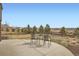 Backyard patio with views of the surrounding landscape provides a space for relaxation at 14734 Domino Dr, Parker, CO 80134