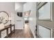 Inviting entryway features wood floors, neutral paint, and modern accents at 14734 Domino Dr, Parker, CO 80134