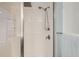 Modern tiled shower with glass door and rainfall shower head at 14734 Domino Dr, Parker, CO 80134