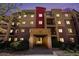 Three-story condo building with brick accents and an inviting entrance at 1144 Rockhurst Dr # 105, Highlands Ranch, CO 80129