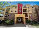 Three-story condo building with brick accents and an inviting entrance at 1144 Rockhurst Dr # 105, Highlands Ranch, CO 80129