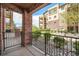 Patio with beautiful views of the community landscaping and architecture at 1144 Rockhurst Dr # 105, Highlands Ranch, CO 80129