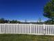 Fenced-in backyard featuring mountain views in the distance at 5483 Gunnison Dr, Frederick, CO 80504