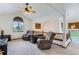 Upstairs living room with two plush recliners with vaulted ceilings, a ceiling fan and two pendant lights at 5483 Gunnison Dr, Frederick, CO 80504