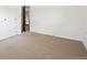Bedroom with carpet and a closet at 10150 Melody Dr, Northglenn, CO 80260