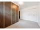 Bedroom with carpet and closets at 10150 Melody Dr, Northglenn, CO 80260