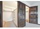 Walk-in closet with built-in shelving and drawers at 10150 Melody Dr, Northglenn, CO 80260