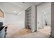 Spacious unfinished basement featuring concrete floor and white painted brick walls, ideal for customization and expansion at 1723 Robb St # 43, Lakewood, CO 80215