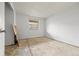 Bedroom featuring a window and blank canvas with unfinished floors, awaiting personalization and design at 1723 Robb St # 43, Lakewood, CO 80215