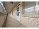 Hallway featuring a door and apartment number 43 at 1723 Robb St # 43, Lakewood, CO 80215