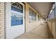 Hallway featuring a door and apartment number 43 at 1723 Robb St # 43, Lakewood, CO 80215