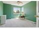 Neutral bedroom featuring natural light, carpet floors, and simple decor at 19157 E Progress Ave, Centennial, CO 80015