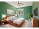 Staged bedroom with a queen bed, nightstands, modern decor, and abundant natural light at 19157 E Progress Ave, Centennial, CO 80015