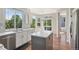 Bright kitchen features an island, stainless steel appliances, and a window with a view of the outdoors at 19157 E Progress Ave, Centennial, CO 80015