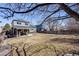 Large, grassy backyard with a covered patio, perfect for entertaining or relaxing at 9377 Weeping Willow Ct, Highlands Ranch, CO 80130