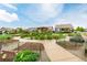 Community garden featuring garden beds, walking paths, and communal spaces for residents at 619 Brennan Cir, Erie, CO 80516