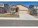 Charming single-Gathering home features a two-car garage, covered porch, and well-maintained front yard at 1820 Taos St, Brighton, CO 80603