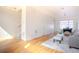 Bright, open living room with hardwood floors and modern décor, ready for entertaining or relaxing at 722 W 6Th Ave, Denver, CO 80204