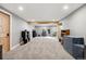 Finished basement featuring plush carpeting, neutral paint, wood beam accent and lots of light at 5537 Lake Gulch Rd, Castle Rock, CO 80104