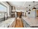 Gourmet kitchen featuring stainless steel appliances, granite countertops, and wood floors at 5537 Lake Gulch Rd, Castle Rock, CO 80104