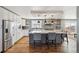 Kitchen boasts stainless steel appliances, granite countertops, and eat-in island at 5537 Lake Gulch Rd, Castle Rock, CO 80104