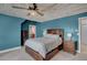 Serene main bedroom with wood-paneled ceilings, en-suite bathroom, and elegant furnishings at 5537 Lake Gulch Rd, Castle Rock, CO 80104