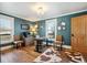 Inviting office space with hardwood floors, natural light, and stylish decor, perfect for remote work at 5537 Lake Gulch Rd, Castle Rock, CO 80104