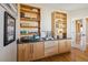 Built-in bookshelves and storage with granite countertops provide ample display space at 6503 S Quemoy Way, Aurora, CO 80016