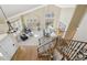 Grand foyer with high ceilings, elegant staircase, and abundant natural light at 6503 S Quemoy Way, Aurora, CO 80016