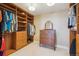 Spacious walk-in closet with custom shelving and storage at 6503 S Quemoy Way, Aurora, CO 80016