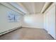 Bright bedroom featuring hardwood floors and ample closet space at 1180 Yosemite St # 110, Denver, CO 80220
