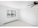 Bright bedroom with ceiling fan and window at 1008 N Corona St # 204, Denver, CO 80218