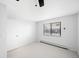 Bright bedroom with carpeted floor, window, and neutral walls at 1008 N Corona St # 204, Denver, CO 80218