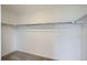 Walk-in closet space with shelving and carpeted flooring at 15285 Milwaukee St, Thornton, CO 80602