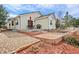 Inviting backyard featuring a patio, a built-in grill, and landscaped areas perfect for outdoor entertaining at 1128 S Duquesne Cir, Aurora, CO 80018