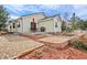 Backyard featuring a patio, an outdoor grill, and landscaping perfect for entertaining at 1128 S Duquesne Cir, Aurora, CO 80018