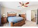 Comfortable bedroom with vaulted ceilings, carpeting, and great natural light at 1128 S Duquesne Cir, Aurora, CO 80018