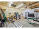 Spacious garage with ample workspace, tools, and storage, great for DIY projects and organization at 1128 S Duquesne Cir, Aurora, CO 80018