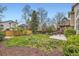 Well-maintained backyard with green lawn and wooden fences offering privacy, plus a two-story deck at 6382 Freeport Dr, Highlands Ranch, CO 80130
