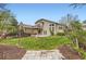 View of the backyard showing a well-manicured lawn, and a two-story deck at 6382 Freeport Dr, Highlands Ranch, CO 80130
