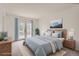 Bedroom with a large bed, wood furniture, and French doors leading to a balcony at 6382 Freeport Dr, Highlands Ranch, CO 80130