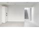 Unfinished basement with neutral carpeting and ample space at 1315 Holly St, Denver, CO 80220