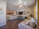 Bright living room with hardwood floors and comfy sofas at 13616 Garfield St # B, Thornton, CO 80602