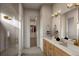 Modern bathroom featuring a double sink vanity, glass shower, and stylish finishes at 2021 Grayside Cir, Castle Rock, CO 80109